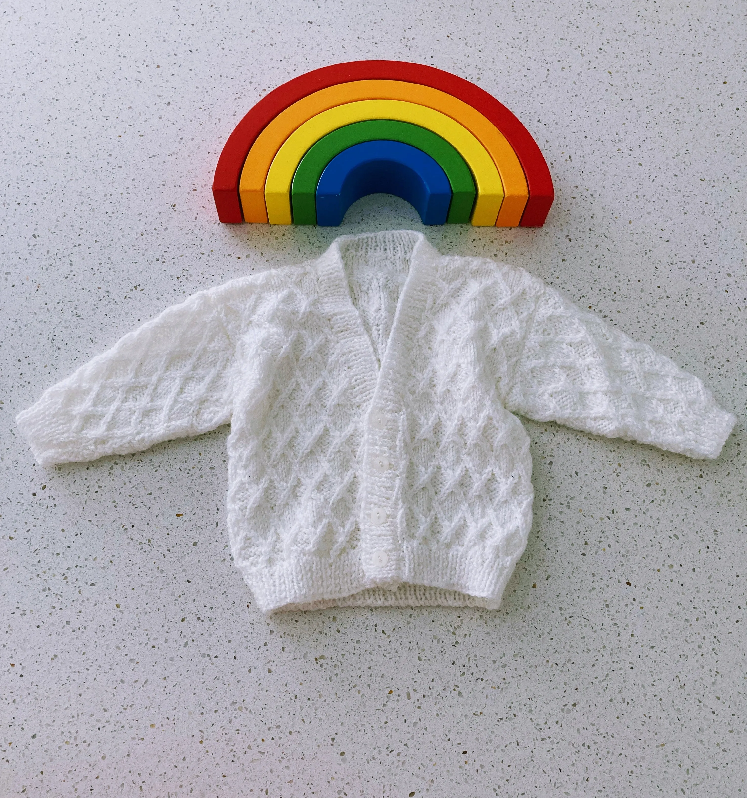 White knitted cardigans